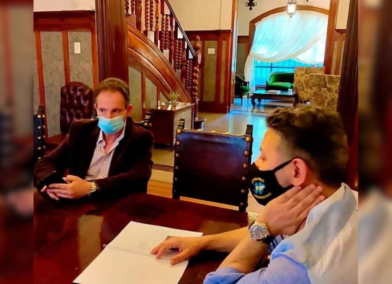 El opositor que nunca fue: Eduardo Varela junto a Gustavo Menéndez.