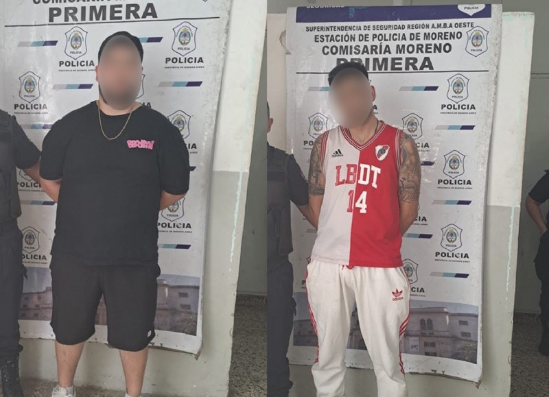 Los hombres detenidos en la estación de servicio.